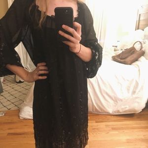 Black sequin sheath or baby doll party dress